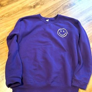 Deep purple smilie Jerzees sweatshirt.